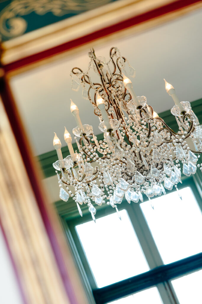 Crystal chandeliers at romantic oceanside wedding venue in Beverly MA