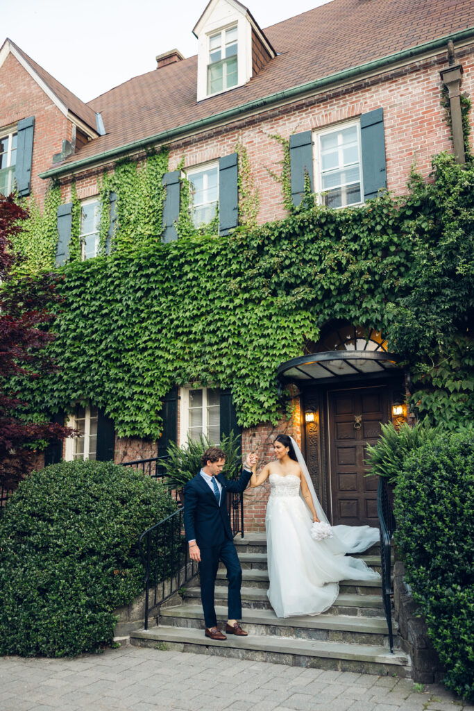 Iconic stair moment for bride and groom outside of their estate wedding